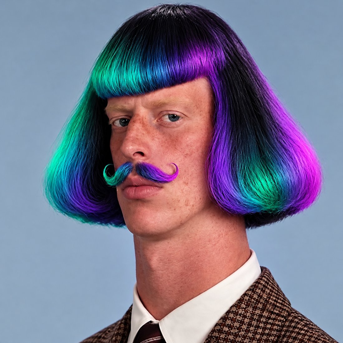 Jean — aurora bob, curled mustache, tweed jacket